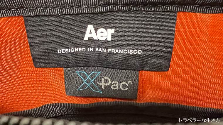 Aer Day Sling 3 Max X-Pac, Briefing Pike, ロゴ